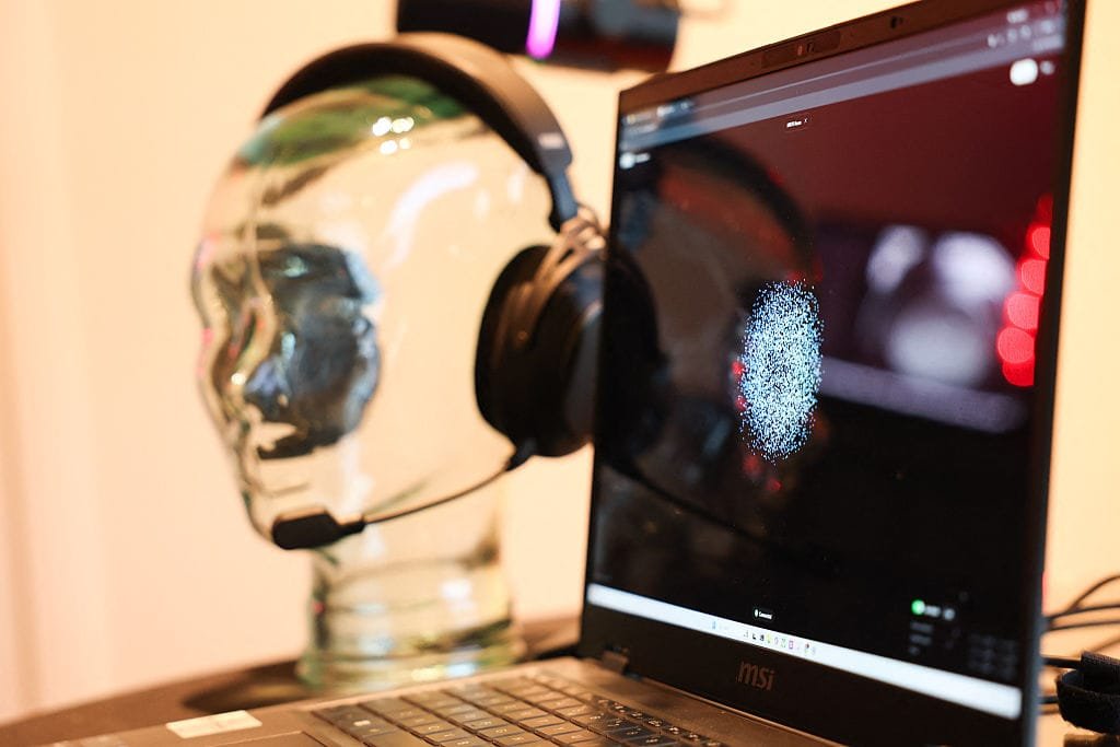 Graphic showing Merge Labs’ brain-computer interface concept: a human brain wirelessly connecting to a computer, representing noninvasive devices that read and send signals, highlighting Sam Altman and OpenAI’s investment in the technology.